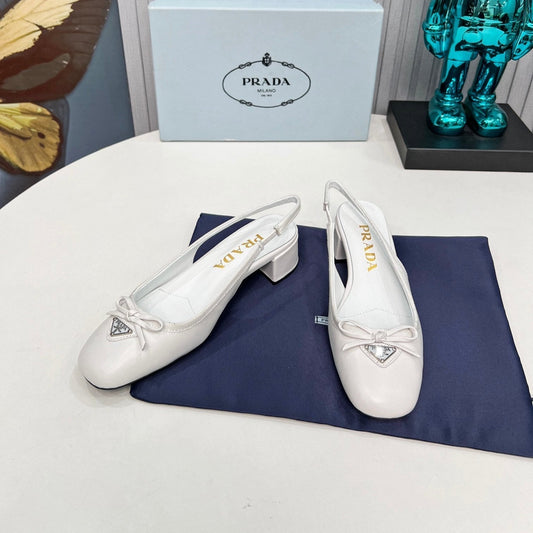 Prada 26s Round Toe Slingback Pumps 40mm In White Calfskin With Bow