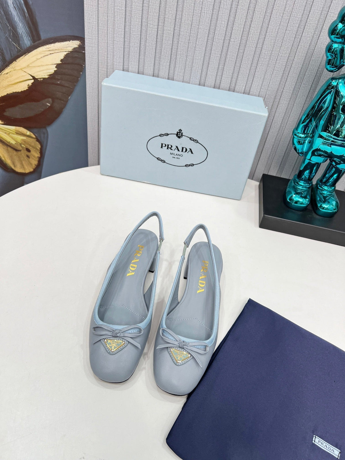 Prada 26s Round Toe Slingback Pumps 40mm In Light Blue Calfskin With Bow