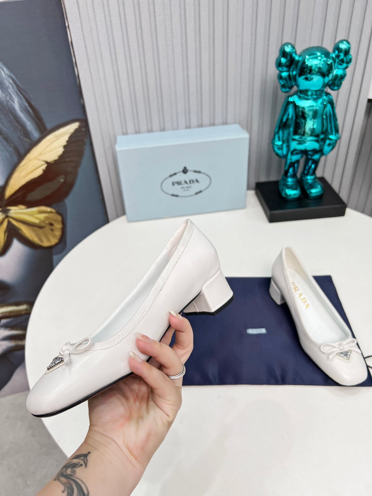 Prada 26s Round Toe Pumps Block Heel 40mm In White Calfskin With Bow