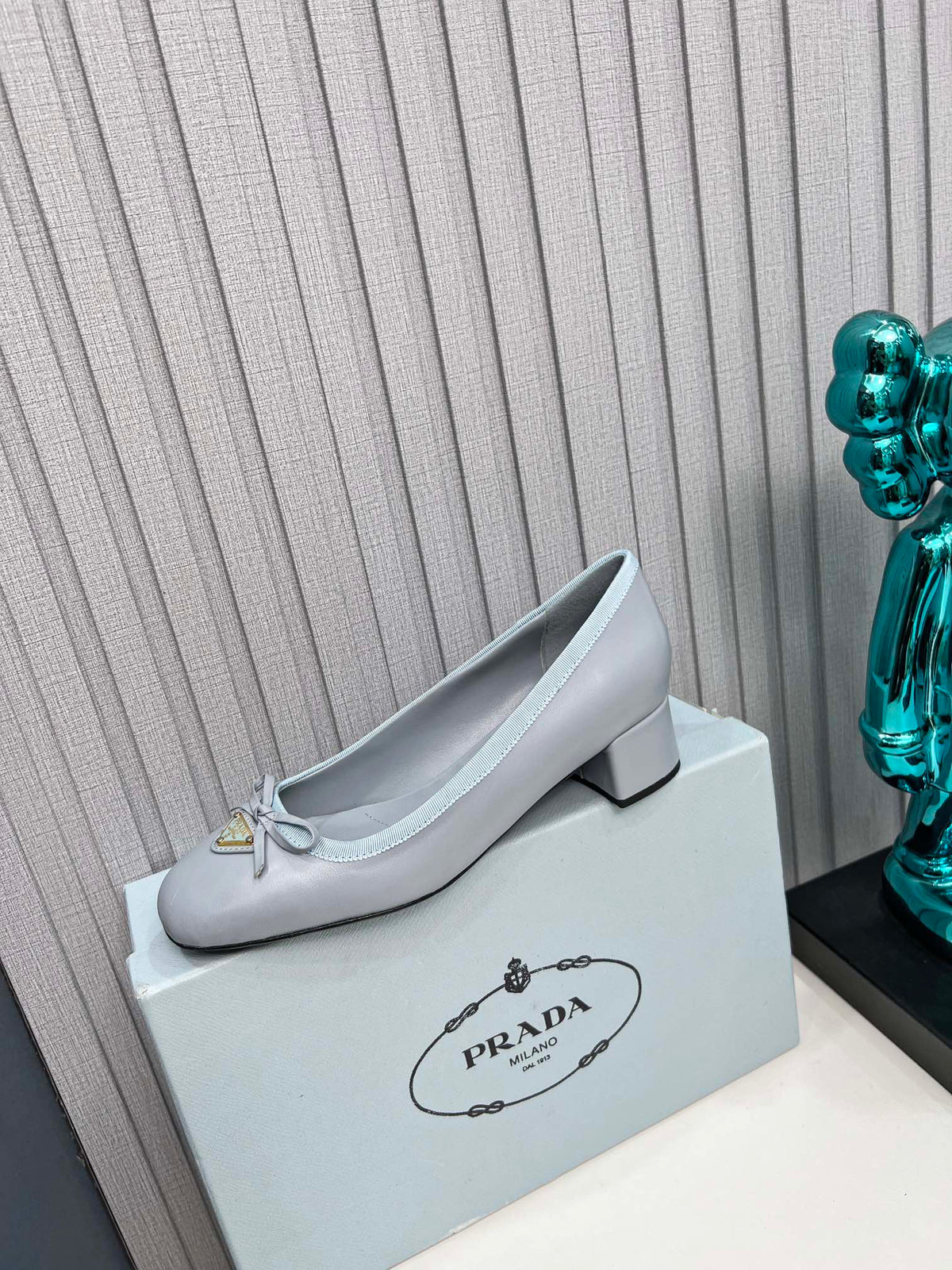 Prada 26s Round Toe Pumps Block Heel 40mm In Light Blue Calfskin With Bow