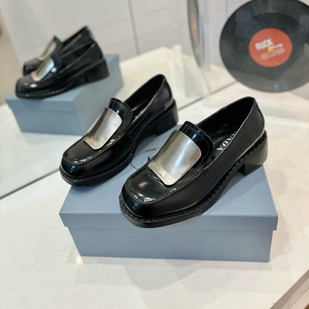Prada 26s Metal Plate Loafers Black Brushed Leather 941513