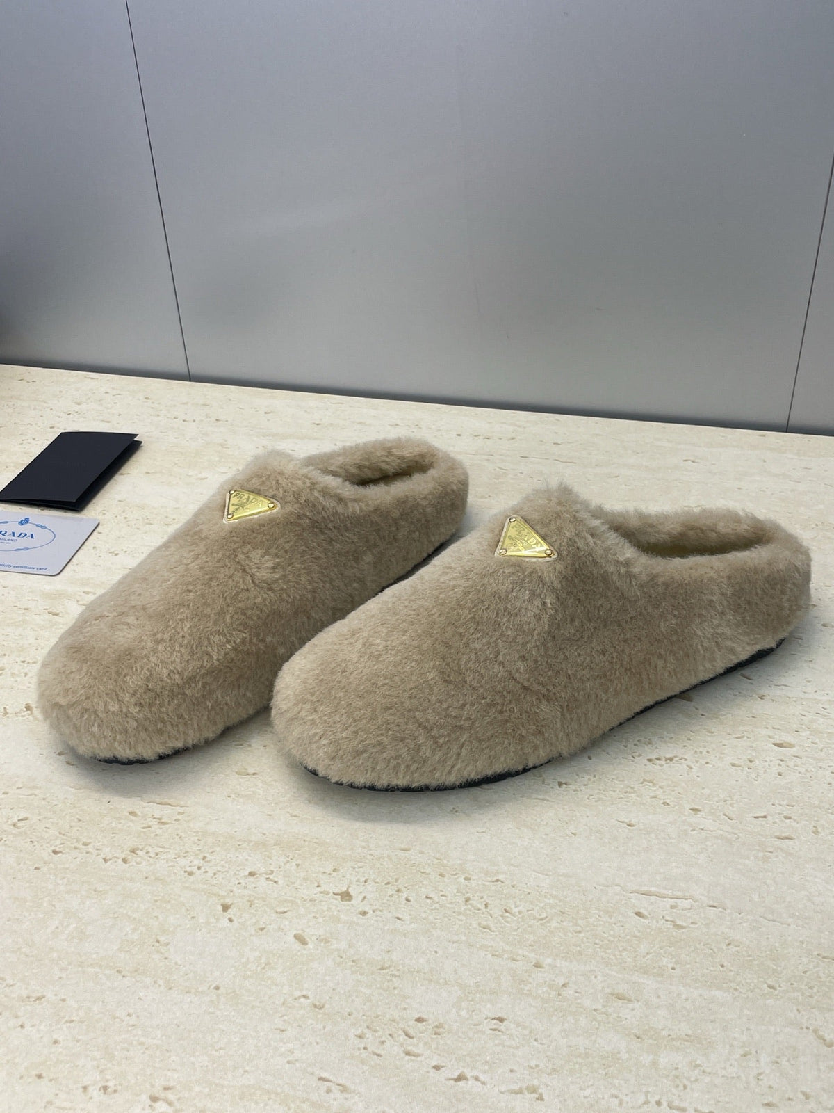 Prada 25s Slide Warm Beige Shearing 551888